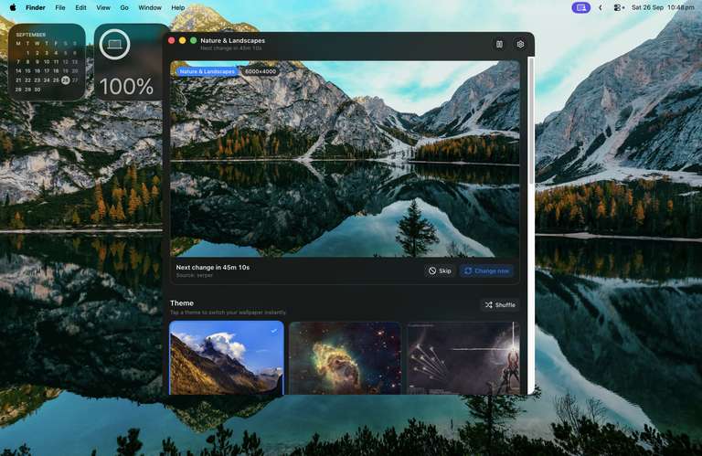 Infinite Wallpapers app window on a macOS desktop, previewing a mountain-lake wallpaper with a countdown to the next change, Skip and Change now buttons, and a grid of theme presets